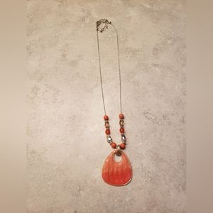Beautiful coral necklace. Silver chain, big coral pendant with small beads.